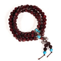Mala made of elastic wood with decorative beads and dorje