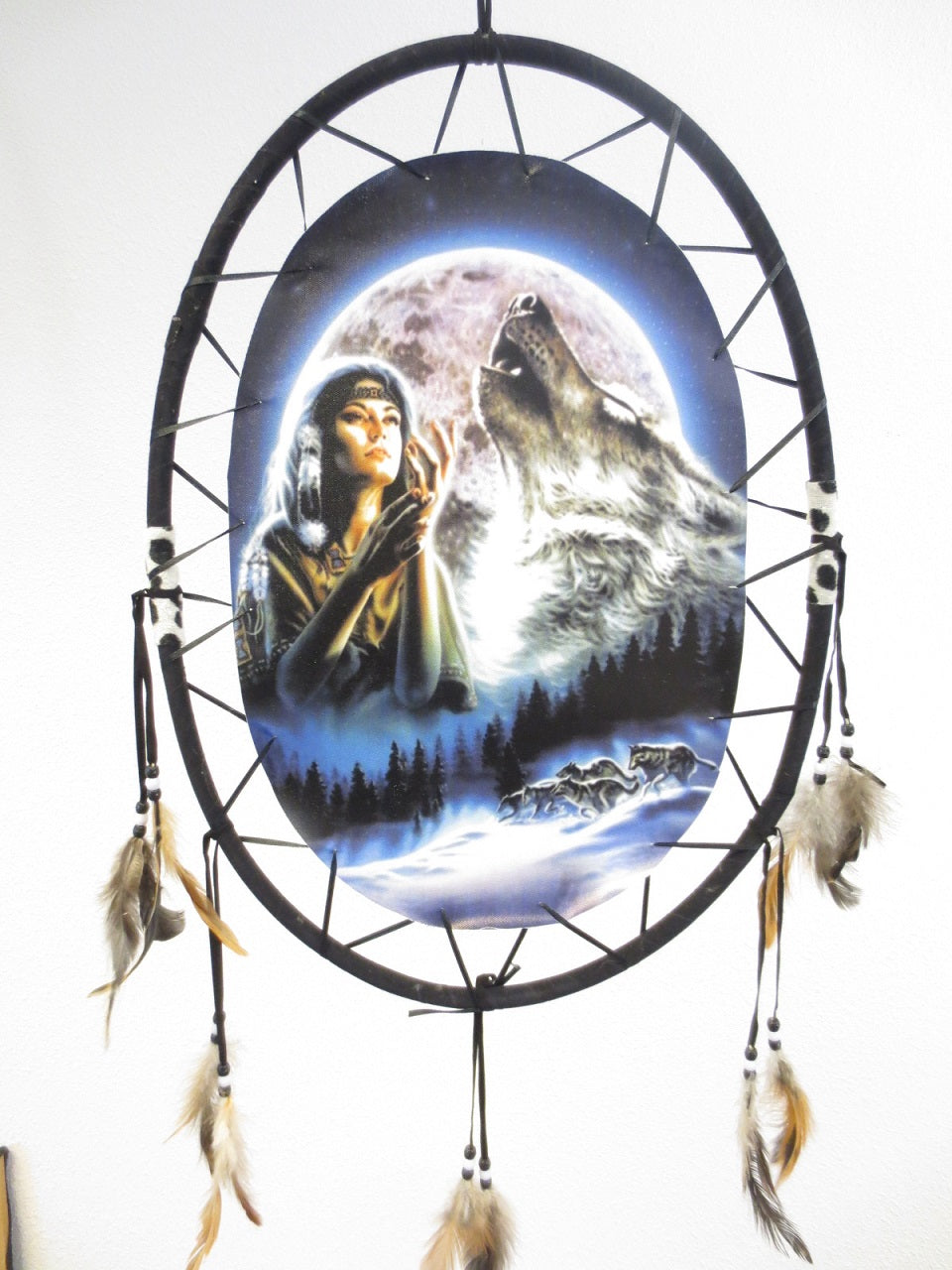 Dream catcher with Indian woman and wolf